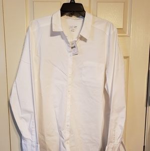 Asymmetric button down shirt.